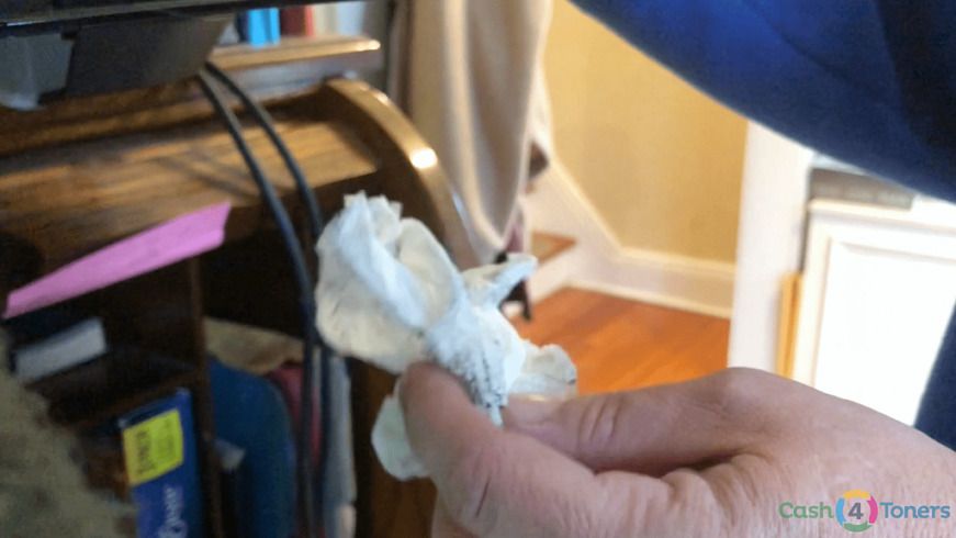 Dirty cloth after cleaning printer rollers