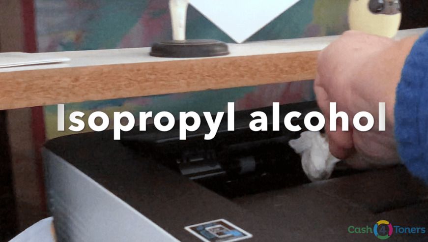 Isopropyl alcohol and a clean cloth used to clean printer rollers