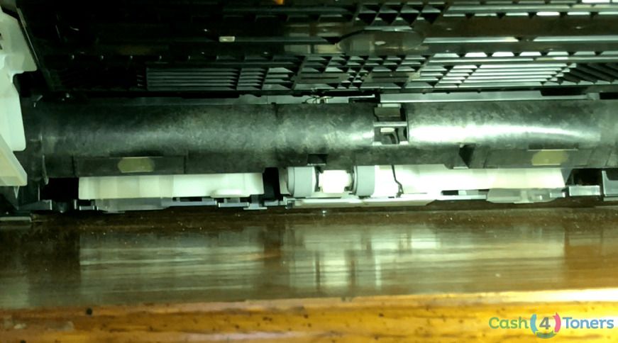 Paper uptake rollers inside a printer